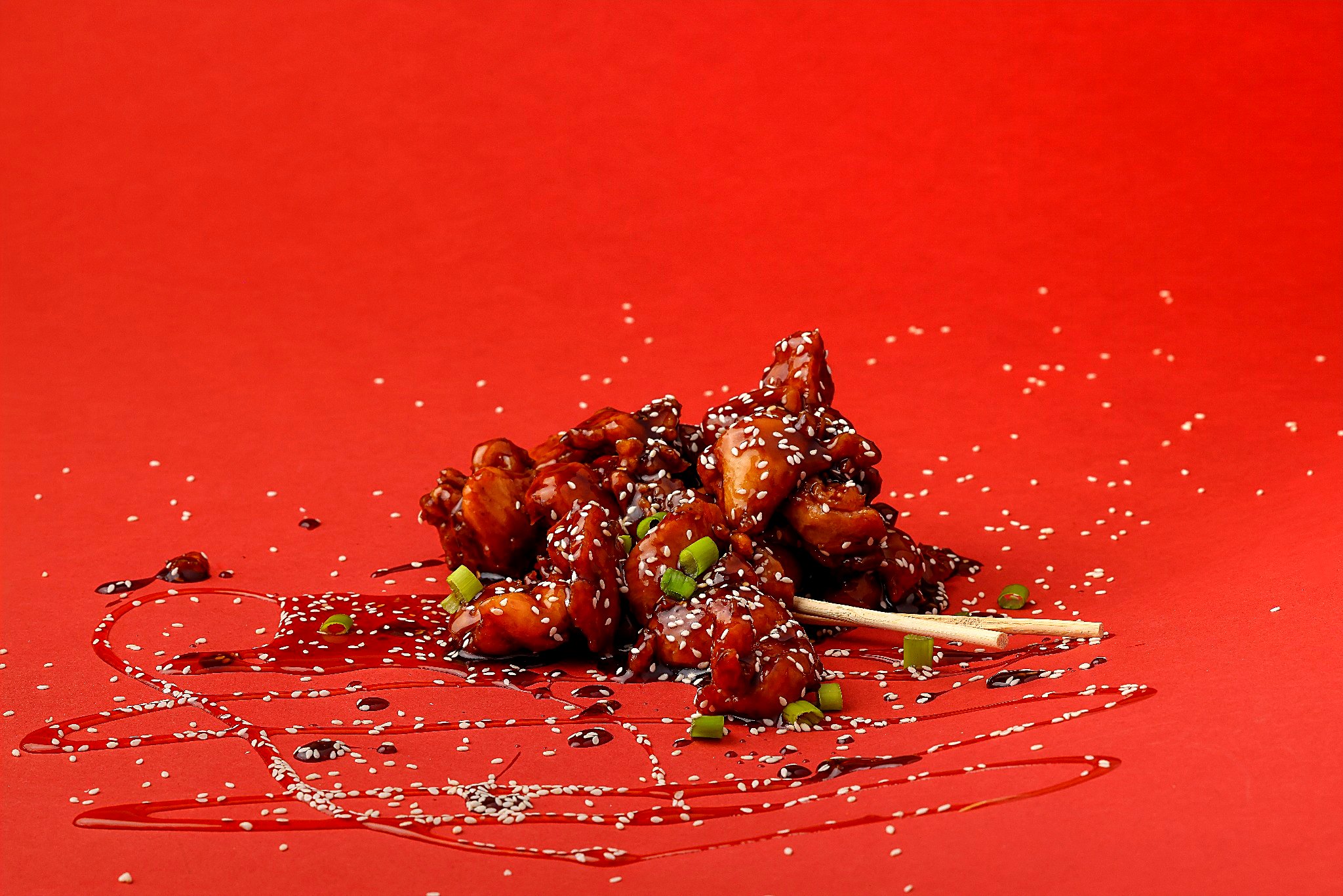 Sticky teriyaki chicken with sesame and scallions